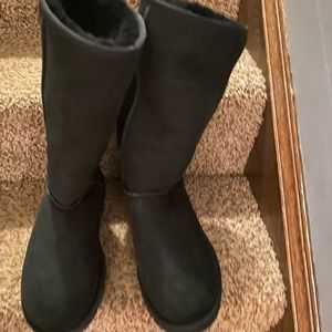 Tall black UGG boots